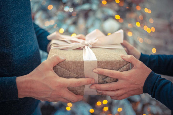 Should you buy your boss a holiday gift? ,