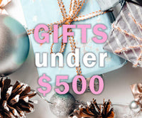 The text reads "gifts under $500" The background shows presents. ,